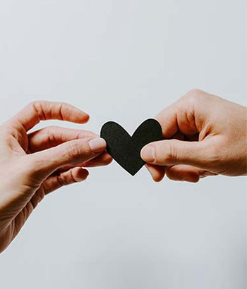 hands holding a heart